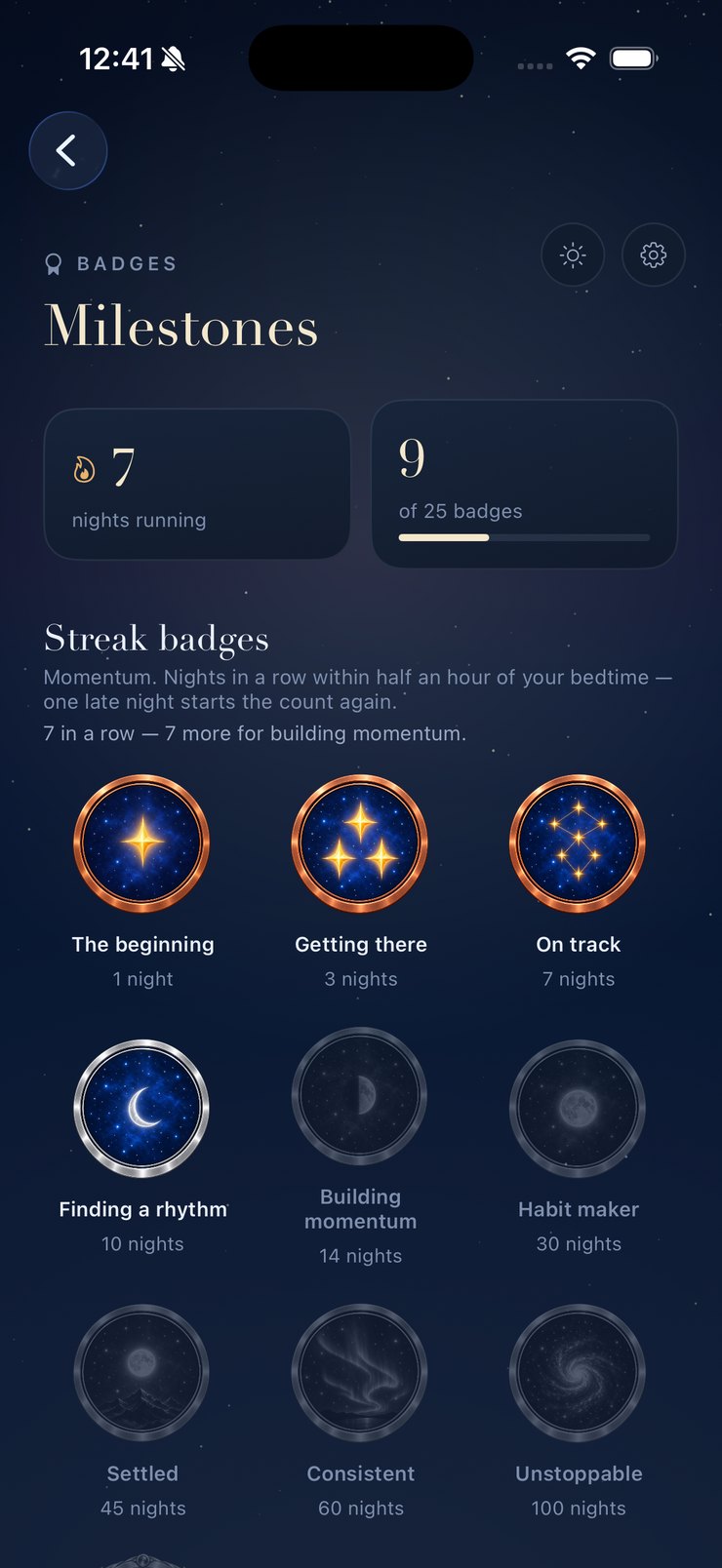 The badge wall: ten streak medallions in copper, silver and gold, the unearned ones shown as silhouettes.
